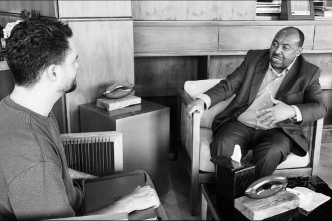 Jim Stenman speaking with veteran diplomat Mohamoud Dirir Gheddi (1)